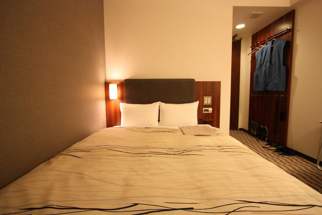 Uozu Manten Hotel Ekimae Szoba fotó