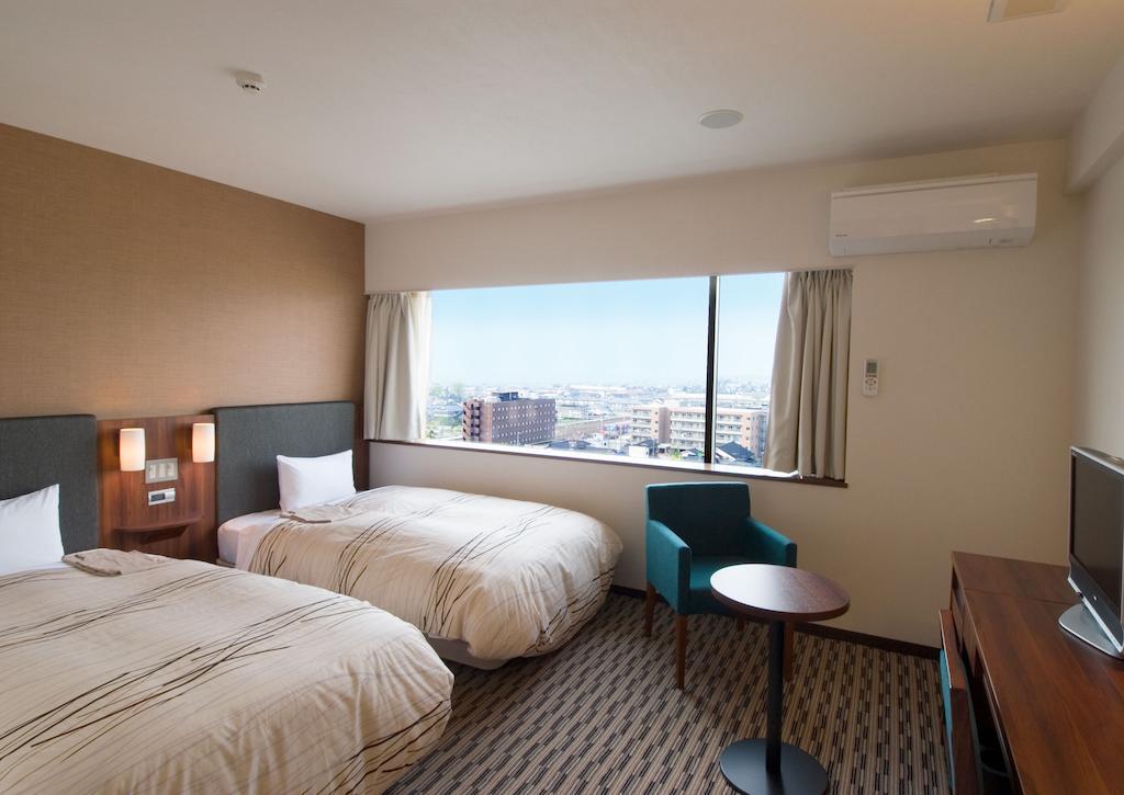 Uozu Manten Hotel Ekimae Szoba fotó